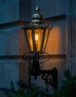 Digital Illustration of the Standard Brass Concordia Hexagonal Lantern With Royale Bracket Lit up at Night Digital Illustration of the Standard Brass Concordia Hexagonal Lantern With Royale Bracket Lit up at Night