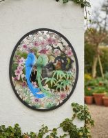Digital Illustration of the Steel Cherry Blossom and Birds Mirrored Wall Art Mounted on a White Wall with Plant Pots in the Background