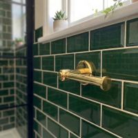 Digital Illustration of the Brass Version of the Toilet Roll Holder Button End Without a Toilet Roll Viewed from an Angle