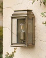 Digital Illustration of the "Walcot" Traditional Wall Lantern. Mounted on a Cream Coloured Rustic Building