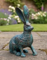 Digital illustration of Verdigris Cast Aluminium "Clover" The Sitting Rabbit Garden Sculpture in a garden