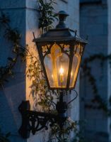 Digital Illustration of the 102 x 54cm Brass Gothic Wall Lantern on Corner Bracket Lit up at Night