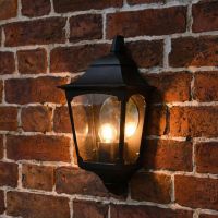 Digital representation of "Tattershall" Black Half Wall Lantern lit up at night