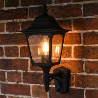 Digital representation of "Tattershall" Traditional Black Wall Lantern lit up at night