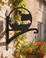 Digital Illustration of the Border Collie Iron Hanging Basket Bracket Mounted on a Cottage Wall