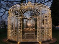 Digital representation of "Lady Belladonna Cristiana" Garden Pavilion lit up at night