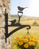 Digital representation of Robin Steel Hanging Basket Bracket mounted on a farm cottage
