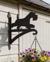 Digital representation of Steel Running Miniature Schnauzer Hanging Basket Bracket mounted on garage