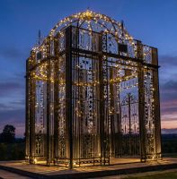 Digital representation of The LUXURY "Royal Alexandria" Wrought Iron Pavilion lit up at night