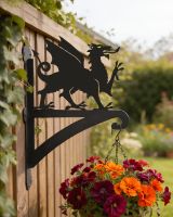Digital representation of Welsh dragon hanging bracket mounted on wooden fence