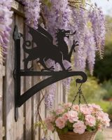 Digital representation of Welsh dragon hanging bracket mounted on rustic garden fence