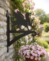 Digital representation of Welsh dragon hanging bracket on cottage wall
