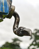 Close up of face detail on scrap metal art sculpture