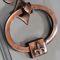 detailed image of striker handle finished in antique copper