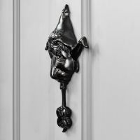 Unique 3D Elf door knocker on grey door