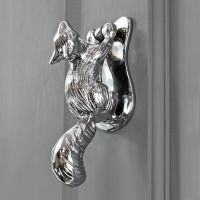 Bright Chrome Squirrel door knocker on Grey door