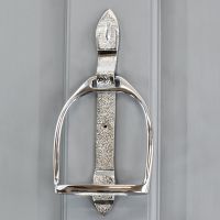 Bright Chrome Stirrup door knocker on Grey door Bright Chrome Stirrup door knocker on Grey door