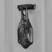 Black Bat Door Knocker on Grey Door Black Bat Door Knocker on Grey Door