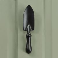 Black Trowel Door Knocker on Green door
