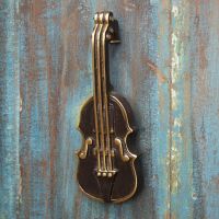 Antique Brass Violin Door Knocker on Rustic Blue Door Antique Brass Violin Door Knocker on Rustic Blue Door