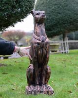 "Rocket" the Sitting Greyhound in Cast Aluminium - Copper to scale with hand in shot for reference