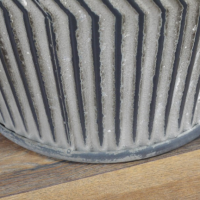 Close-up of the Base of the Vintage Metal Dolly Tub Set