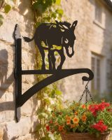Digital Illustration of the Donkey Hanging Iron Basket Bracket Mounted on a Rustic Cottage Wall Digital Illustration of the Donkey Hanging Iron Basket Bracket Mounted on a Rustic Cottage Wall