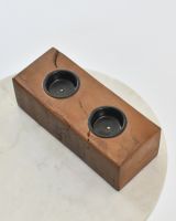 Close up of rustic double tealight holder