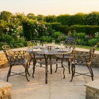 dressed table The "Riverhill" 4- Seater Garden Dining Set - Brushed Gold digital illustration