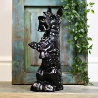 Black metal dog door stop