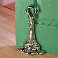 Bright Chrome Coalbrookdale Door Porter holding green door Bright Chrome Coalbrookdale Door Porter holding green door