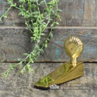 Shell Design Door Stop Finished in Polished Brass