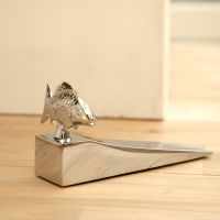 Novelty fishy door wedge by door