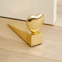 polished brass door stop