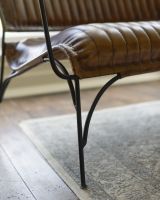 Traditional Brown Leather and Iron Two Seater Chair Frame Close Up
