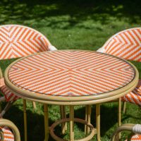 The "Cortes" 4-Seater Outdoor Dining Set Table Close Up In A Garden