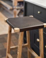 Comfortable rustic brown leather seating.