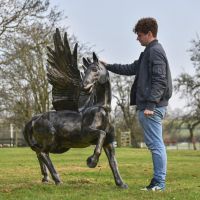 Male with "Starlite" Pegasus Sculpture for Scale 