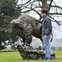 Male with Tatanka Bison Garden Sculpture for Scale