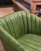 Ribbed leather design in green.