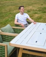 "The Imelda" Six Seater Garden Lounge And BBQ Furniture Set Scale Shot With A Man In A Garden "The Imelda" Six Seater Garden Lounge And BBQ Furniture Set Scale Shot With A Man In A Garden
