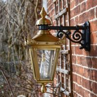 Side profile of Antique Brass Top Fix Wall Lantern on Wall 