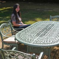 The "Sage Blossom" 8-Seater Garden Dining Set - Sage Green Table details Scale Shot The "Sage Blossom" 8-Seater Garden Dining Set - Sage Green Table details Scale Shot