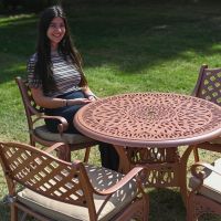 The “Astoria” Deluxe 4-Seater Outdoor Dining Set - Terracotta Scale Shot In A Garden