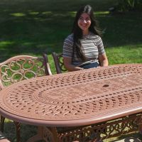 The "Montacute" 6-Seater Garden Dining Set - Antique Terracotta Scale In A Garden