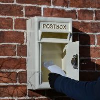 Door open on Cream & Gold Post Box 