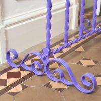 Close up of scroll design in Lilac finish 