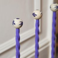 Close up of ceramic balls on “Thedenwood” Lilac Three Pair Welly Rack 