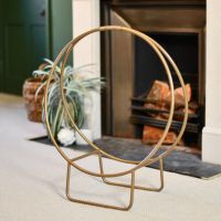 Modern Circular Log holder in a Gold Finish Modern Circular Log holder in a Gold Finish