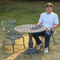The "Royal Ascott" 2-Seater Outdoor Bistro Set - Antique Silver  Scale Shot In A Garden